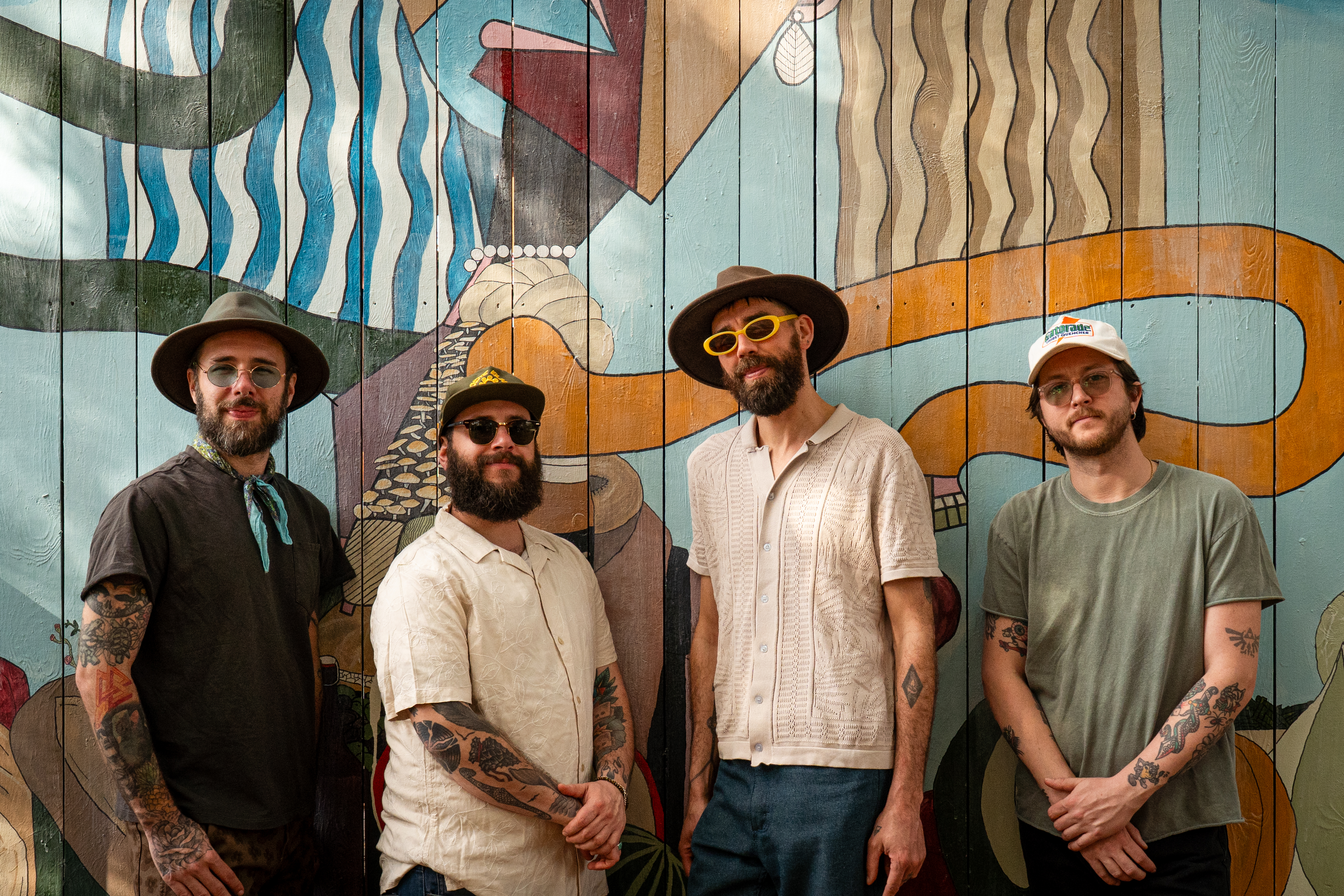 4 members of Coyote Island